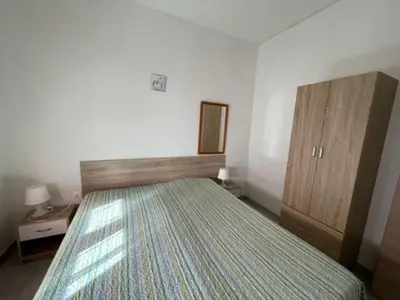 Letto o letti in una camera di Inviting flat for four guests in Rosolina Mare