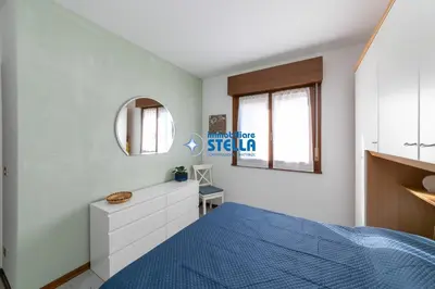Letto o letti in una camera di Condominio Emily