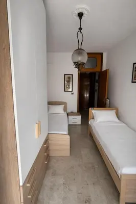 Letto o letti in una camera di Marco Polo House Family Apartment vicino al Mare con Aria Condizionata e Parcheggio Gratuito