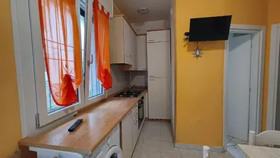 Cucina o angolo cottura di Beachside apartment in Rosolina Mare
