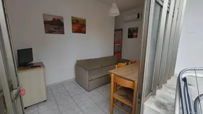 TV o dispositivi per l'intrattenimento presso Beachside apartment with parking