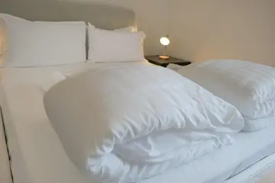 Letto o letti in una camera di Welc-ōM Sant'Eufemia Padova