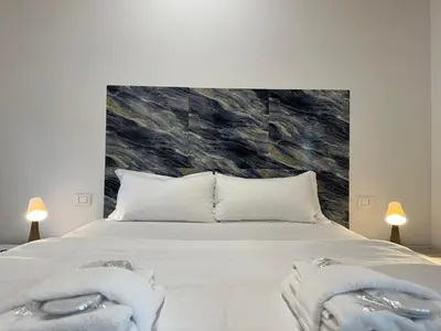 Letto o letti in una camera di Welc-ōM Ponte di Brenta Free Parking