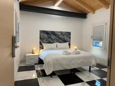 Letto o letti in una camera di Welc-ōM Ponte di Brenta Free Parking
