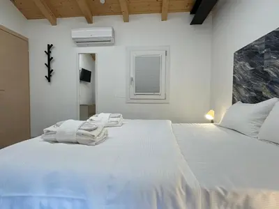 Letto o letti in una camera di Welc-ōM Ponte di Brenta Free Parking