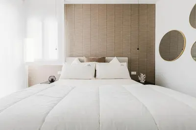 Letto o letti in una camera di Jesolo Altamarea The Level Suite