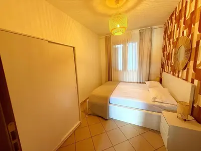 Letto o letti in una camera di Apartment with premium amenities, Rosolina