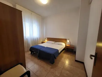 Letto o letti in una camera di Villa Mazzon Family Apartments