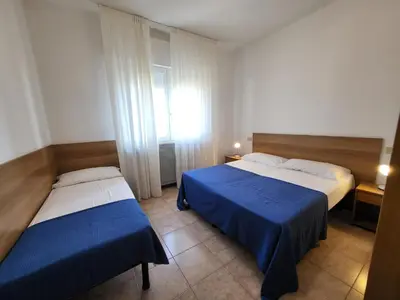 Letto o letti in una camera di Villa Mazzon Family Apartments