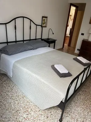 Letto o letti in una camera di Ca'Furlani