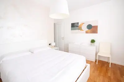 Letto o letti in una camera di Domus Solferino - Private Parking near Airport & City Center