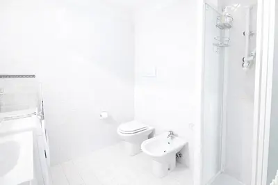 Bagno di Domus Solferino - Private Parking near Airport & City Center