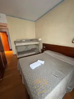 Letto o letti in una camera di Affitta Camere Padova