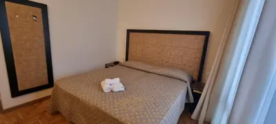 Letto o letti in una camera di Affitta Camere Padova