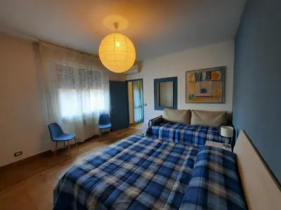 Letto o letti in una camera di PadovaResidence Apartments - vicino Cappella degli Scrovegni e Ospedale