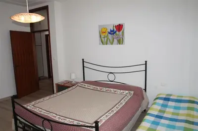 Letto o letti in una camera di Nereadi Family Apartment