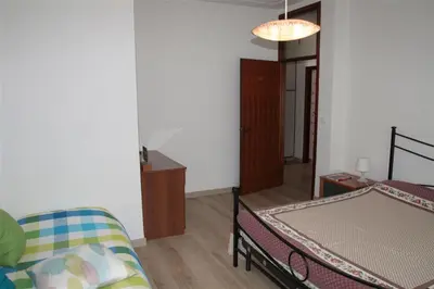 Letto o letti in una camera di Nereadi Family Apartment