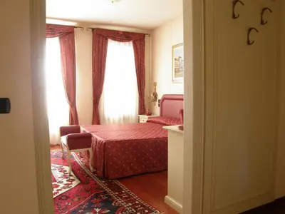 Letto o letti in una camera di Residence Meuble' Cortina
