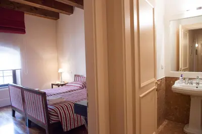 Letto o letti in una camera di Residenza Giudecca Molino Stucky
