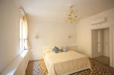 Letto o letti in una camera di Antico Mercato