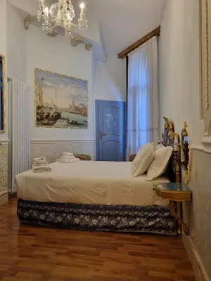 Letto o letti in una camera di Casa Alla Fenice
