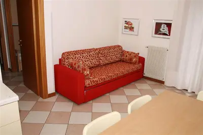 Area soggiorno di Family Apartments Residence Trieste