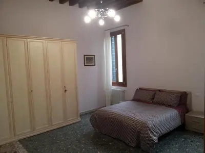 Letto o letti in una camera di Venice House