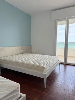 Letto o letti in una camera di RESIDENCE FARO - WALTERIGATO Apartments SOLO PER FAMIGLIE