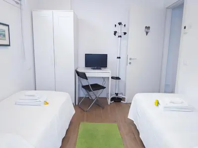 Letto o letti in una camera di B&B Ca' Rina