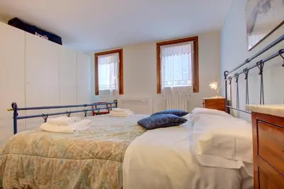 Letto o letti in una camera di CROSS-CANAL set