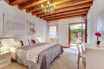 Letto o letti in una camera di Cannaregio - Venice Style Apartments