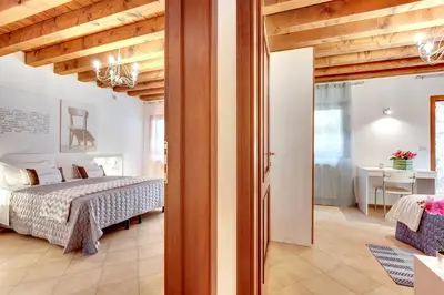 Letto o letti in una camera di Cannaregio - Venice Style Apartments