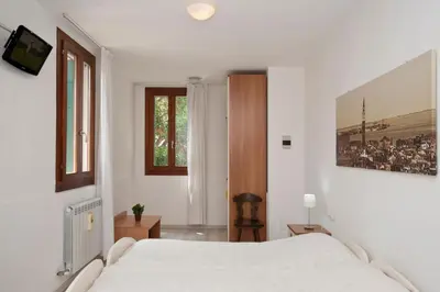 Letto o letti in una camera di Ca' Del Pomo Grana'
