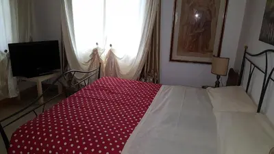 Letto o letti in una camera di Casa Yami