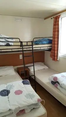 Letto o letti in una camera di Mobilhome Angel