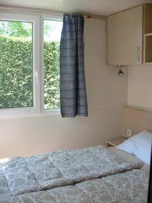 Letto o letti in una camera di Mobilhome Angel