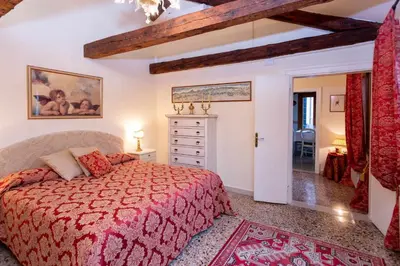 Letto o letti in una camera di San Lio Suite:Close to S Marco square & wi-fi