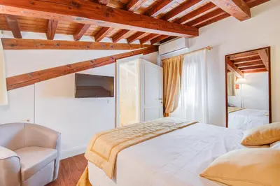 Letto o letti in una camera di Master Venice Apartments