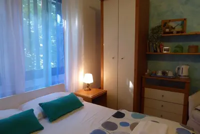 Letto o letti in una camera di B&B Al Santo
