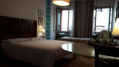 Letto o letti in una camera di B&B Barberia