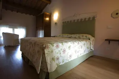 Letto o letti in una camera di Villa Ghislanzoni