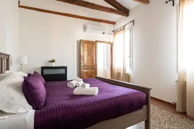 Letto o letti in una camera di Ca' Giorgia Venice Apartment with Balcony