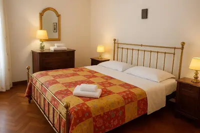 Letto o letti in una camera di Grimaldi Apartments San Marco & Castello
