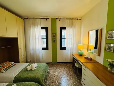 Letto o letti in una camera di Grimaldi Apartments San Marco & Castello