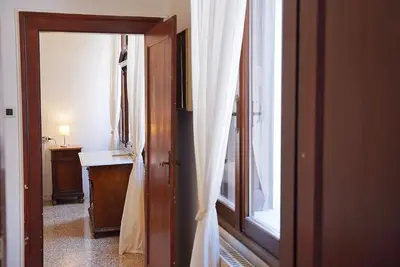 Letto o letti in una camera di Ca' Alle Gondolette by Sarlux