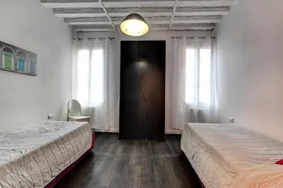 Letto o letti in una camera di Biennale Superior Suite by Wonderful Italy