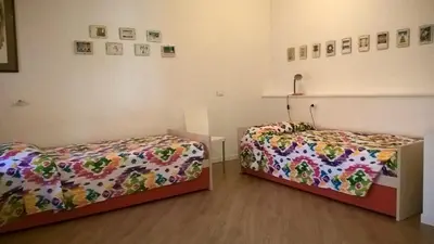 Letto o letti in una camera di Appartamento Venezia Lido