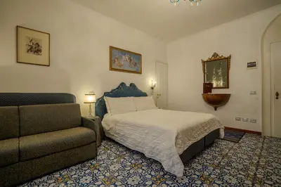 Letto o letti in una camera di Ca' Angeli