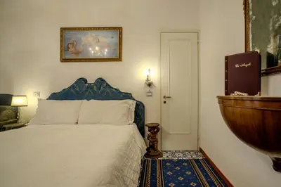 Letto o letti in una camera di Ca' Angeli