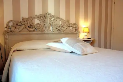 Letto o letti in una camera di Terrazza Biennale